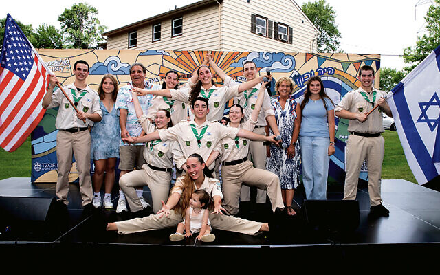 Tzofim Friendship Caravan with Muss alumnae Hannah Kirshenbaum left, Maya Klein, right, both wearing light blue, and Russell and Marci Robinson (Robert Schneider)