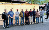 The sukkah-building team at B’nai Israel