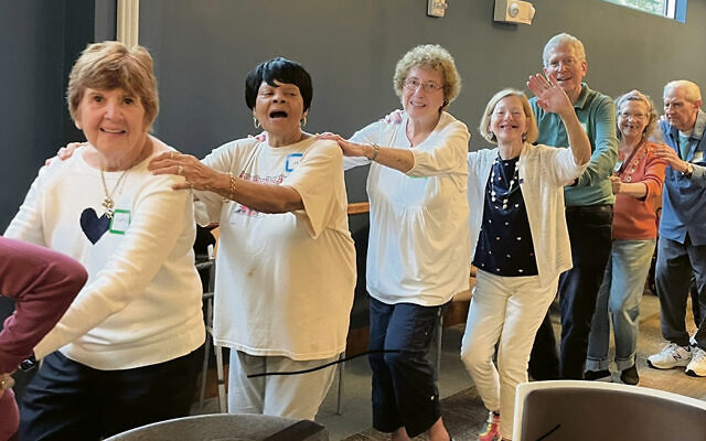Seniors participate in a JCC Coffee House program. (Courtesy JFS)