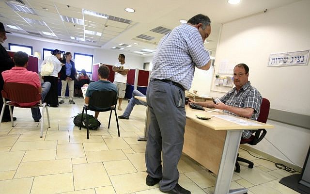 A client seeks work at an unemployment office in Jerusalem (Photo by Yossi Zamir/Flash90)