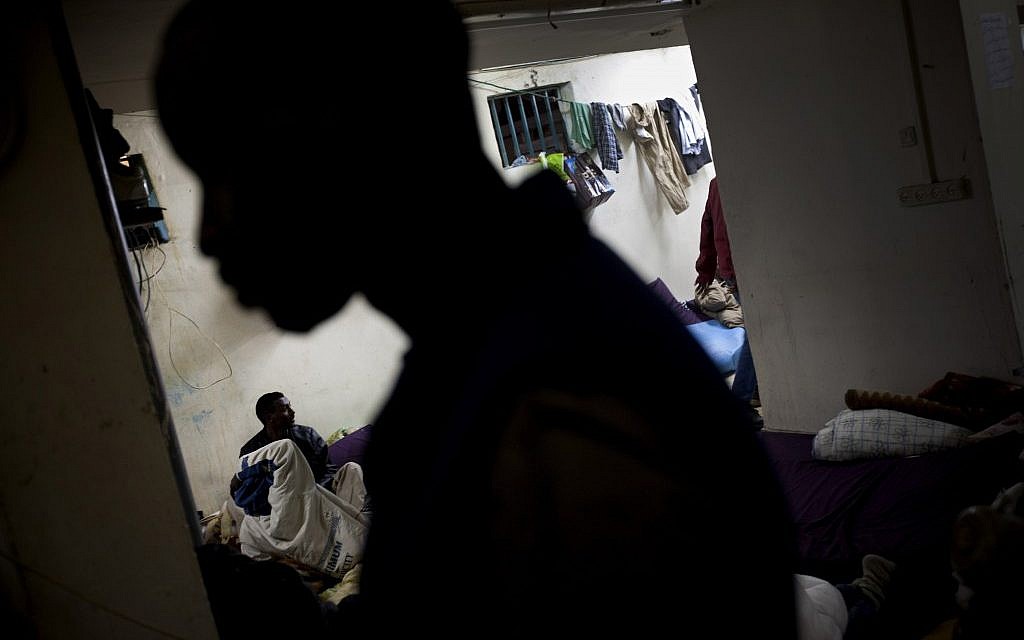 African migrants at a shelter in Tel Aviv (photo credit: AP/Oded Balilty)