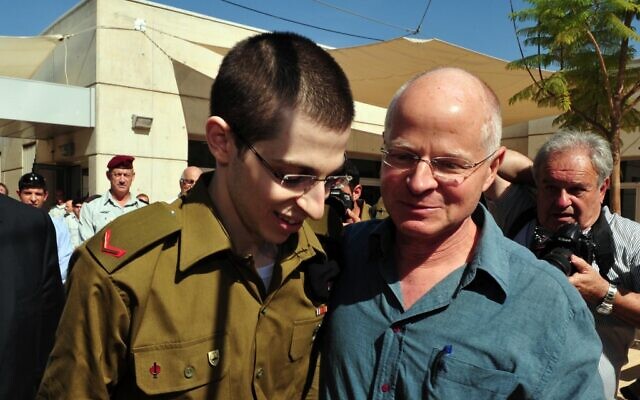 Gilad Shalit with his father, Noam, on the day of his release from captivity (photo credit: Ariel Hermoni/ Defense Ministry/Flash90)