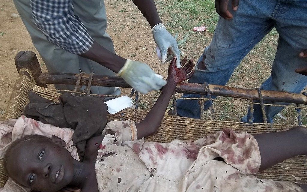 Sudanese girl injured by a government attack in South Kordofan (photo credit: Courtesy)