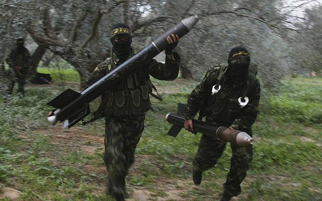 File photo of Islamic Jihad members in Gaza preparing to launch rockets (photo credit: CC BY-SA Amir Farshad Ebrahimi, Flickr)