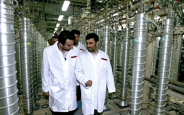 File photo of Iranian President Mahmoud Ahmadinejad visiting the uranium enrichment facility at Natanz in 2008. (photo credit: AP/Iranian President's office, File)