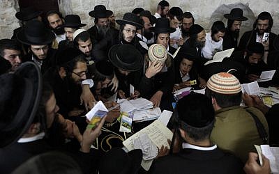 File: Men praying in Joseph's Tomb in the West Bank city of Nablus in 2011 (photo credit: Yaakov Naumi/Flash90)