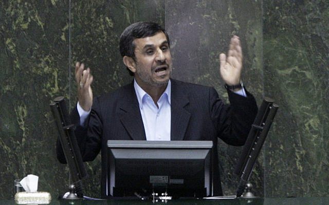 Iranian President Mahmoud Ahmadinejad answers questions in an open session in parliament in Tehran on Wednesday. (photo credit: AP/Vahid Salemi)