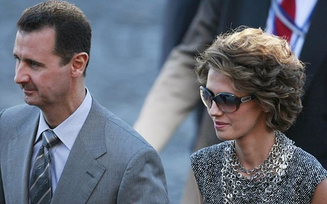 Syrian President Bashar Assad and his wife, Asma (photo credit: AP/Michel Spingler/File)