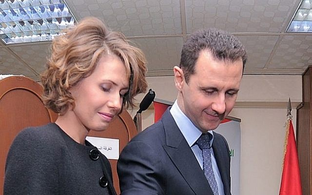 Bashar and Asma Assad (photo credit: AP/SANA)