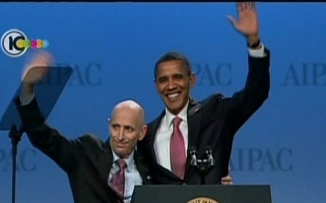 Image capture of US President Barack Obama embracing AIPAC chairman Lee Rosenberg(photo credit: Channel 10)