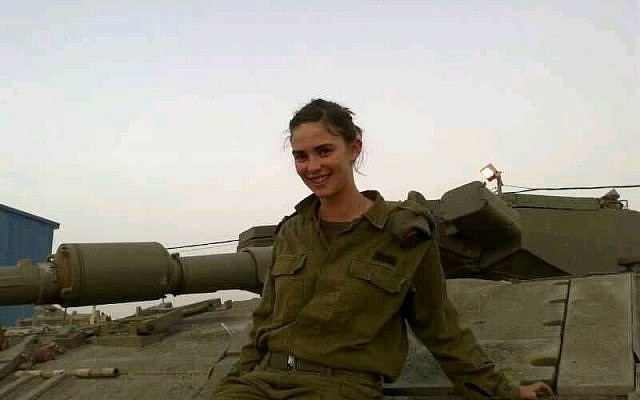 Model Esther Petrack posing on a tank (photo credit: IDF Spokesperson)