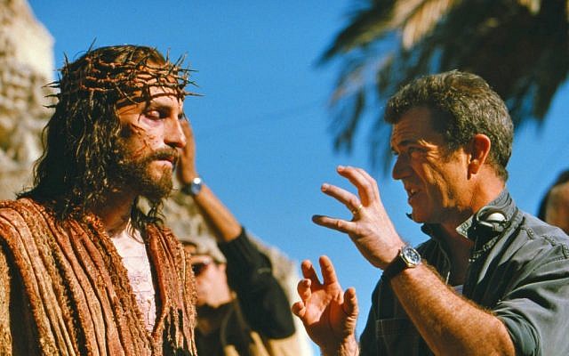 Mel Gibson, right, directs Jim Caviezel on the set of Gibson's movie 'The Passion of The Christ' in 2003 (AP/Icon Productions, File)