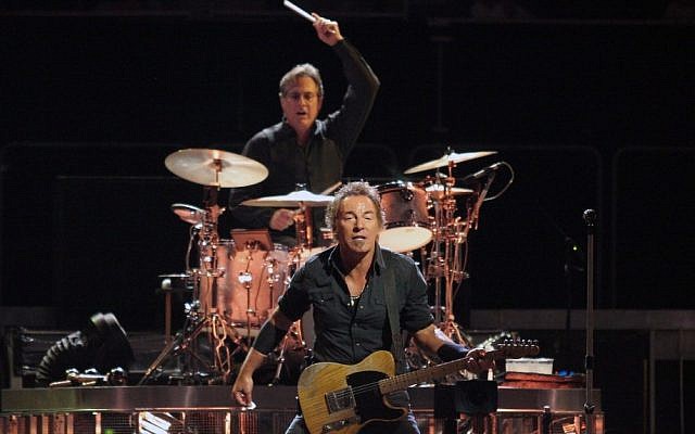 Bruce Springsteen with drummer Max Weinberg in concert. (photo credit: CC-BY-SA, Craig ONeal, Wikipedia)