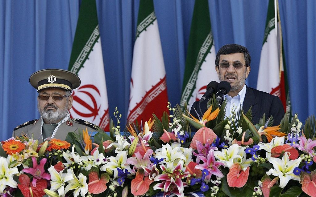 Iranian President Mahmoud Ahmadinejad, right, speaks during a parade commemorating National Army Day in April (photo credit: Vahid Salemi/AP)