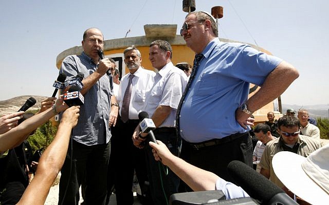 From left: Vice Prime Minister Moshe Ya'alon, Interior Minister Eli Yishai, Information Minister Yuli Edelstein, and Science and Technology Minister Daniel Hershkowitz visit the evacuated settlement of Homesh in the West Bank in 2009. (Photo credit: Miriam Alster/Flash90)
