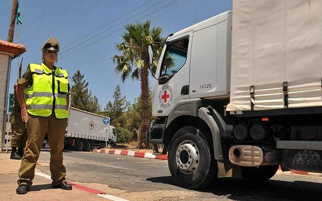 Red Cross trucks carrying the bodies of Palestinian terrorists as part of a 2008 exchange (photo credit:by Hamad Almakt/Flash90)