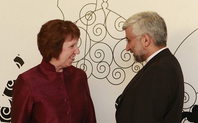 EU Foreign Policy chief Catherine Ashton, left, speaks with Iran's former chief nuclear negotiator Saeed Jalili during May 2012 talks in Baghdad (photo credit: Hadi Mizban/AP)