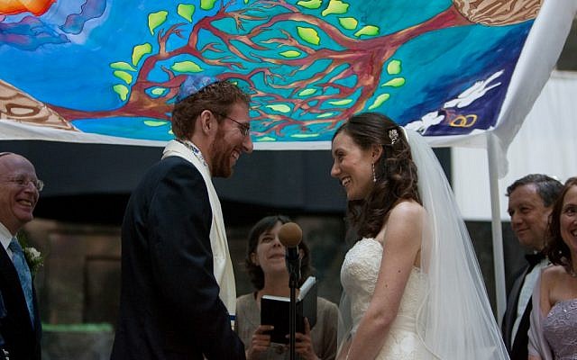 The frequency of interfaith weddings has convinced even many Orthodox Jews to revise their approach to couples of mixed background. (Illustrative photo courtesy of Ashley Novack/JTA)