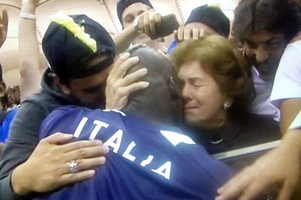 Italy's goal-scorer Mario Balotelli hugs his Jewish foster mother Silvia after Thursday's victory over Germany at Euro 2012. (via Twitter)