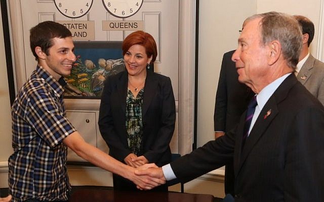 New York Mayor Michael Bloomberg meets with Gilad Shalit in a ceremony commemorating the sixth anniversary of Shalit's capture, Monday June 25 (photo credit: JTA/Spencer T Tucker)