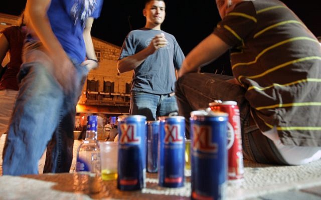 Young Israelis drinking alcohol mixed with energy drinks (photo credit: Kobi Gideon/Flash90)