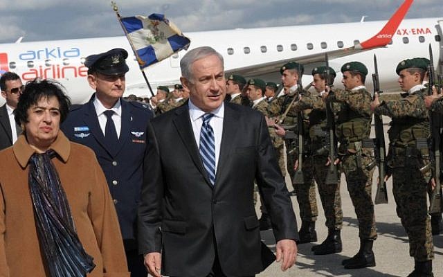 Prime Minister Benjamin Netanyahu with Erato Kozakou Marcoullis, the foreign minister of Cyprus, during his visit to the island country in February (photo credit: Amos Ben Gershom/Flash90/GPO)