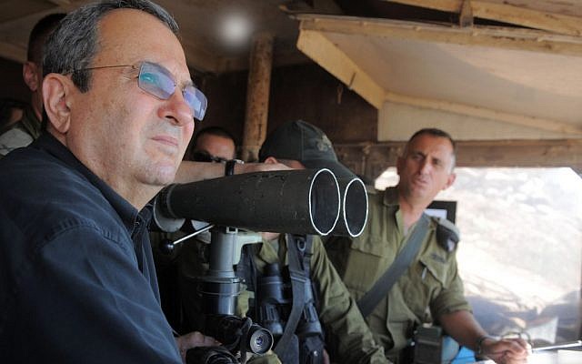 Defense Minister Ehud Barak visiting the IDF Northern Command Unit on the Golan Heights near Syria on Thursday. (photo credit: Ministry of Defense/Flash90)