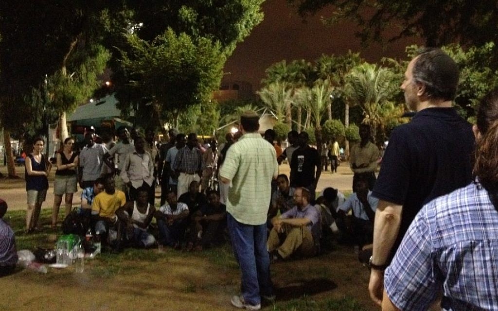 Aaron Frazer speaking at the Livnota b'esh (build it by fire) barbecue to promote conversations between African refugees and Israelis at the Levinsky Park Thursday (photo credit: MIchal Shmulovich)