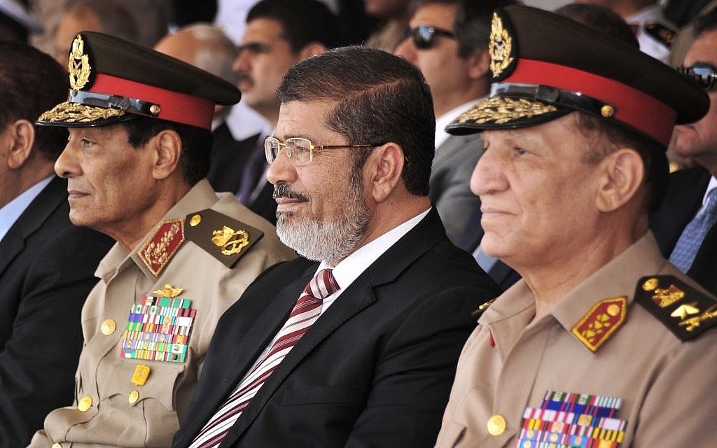 Egypt s Morsi Flexes Political Muscles In Early Days Of Presidency