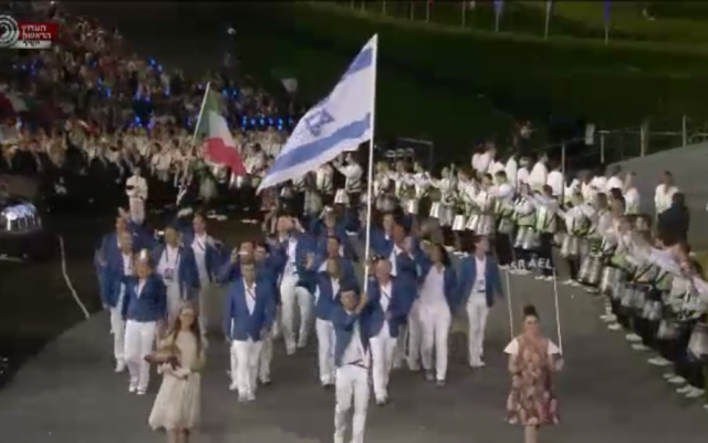 The Israeli national team marching in the Olympic Opening Ceremony Friday night. (photo credit: Image capture from Channel 1)