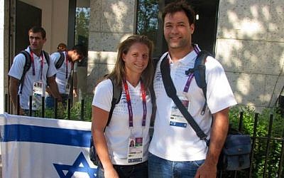 Two of Israel's judokas, Arik Zeevi (right) and Alice Schlesinger at the entrance to the Israeli building at the Olympic village, July 26 (photo credit: courtesy of the Israeli Olympic Committee)