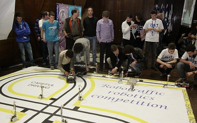 Students present their project at the recent Robotraffic contest (Photo credit: Courtesy) Students present their projects at the recent Robotraffic contest (Photo credit: Courtesy)