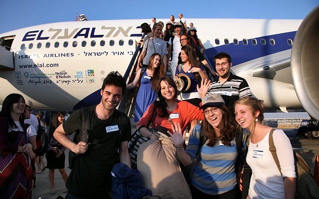A group of 229 new immigrants arriving in Israel through Nefesh B’Nefesh in July. (photo credit: Sason Tiram)