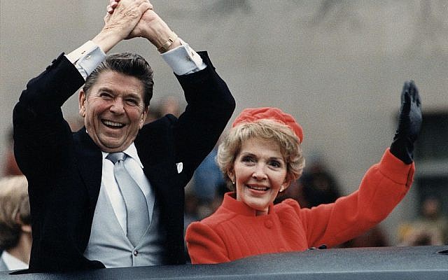 President Ronald Reagan, pictured with wife Nancy at his 1981 inauguration, is credited in a draft of the Republican Party platform as the source of a quotation by Rabbi Hillel. (Photo credit: From http://commons.wikimedia.org/wiki/File%3AThe_Reagans_waving_from_the_limousine_during_the_Inaugural_Parade_1981.jpg)