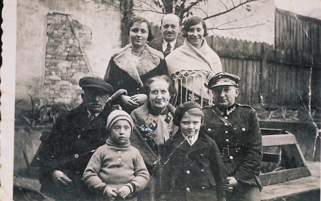 Illustrative: The family of Arnold Greenfeld, Hava Shilo's father, is shown in this 1932 image taken next to their home in Lvov. All eight people were killed in the Holocaust. (Courtesy Hava Shilo via JTA)