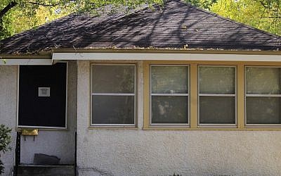 The home of suspected shooter Andrew Engeldinger, 36, of Minneapolis.(photo credit: Elizabeth Flores, Star Tribune/AP) 