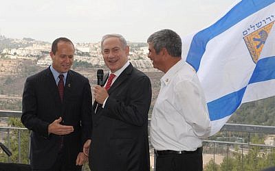 Prime Minister Netanyahu, center, visits the East Jerusalem neighborhood of Gilo, October 23, 2012 (photo credit: Moshe Millner/GPO)