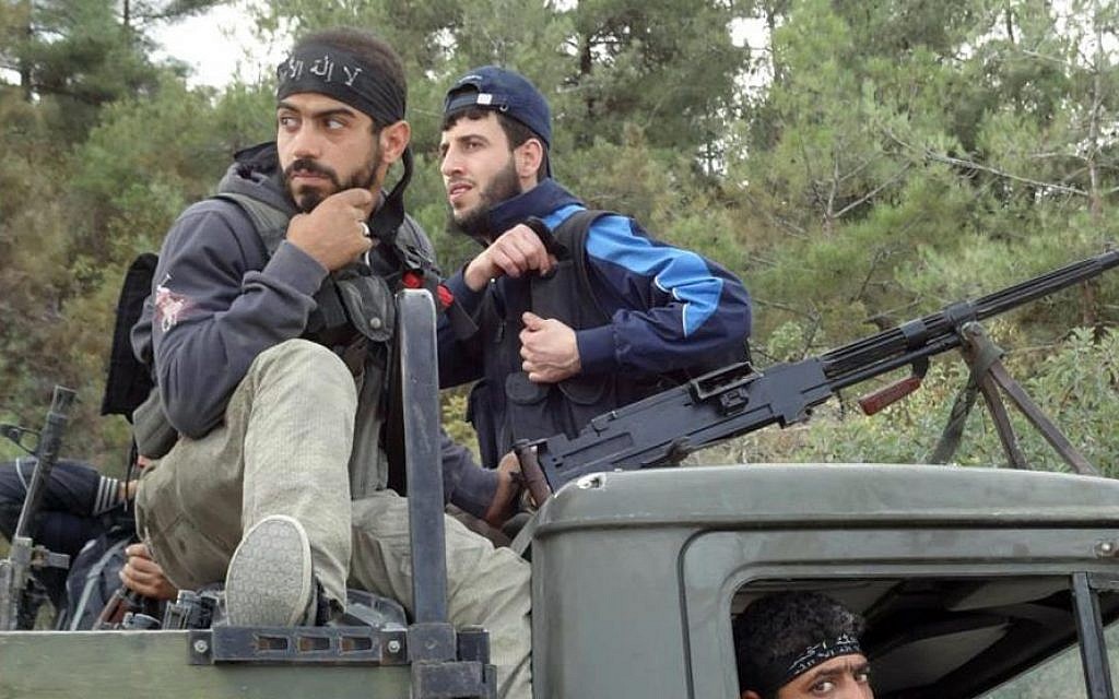 Dengan penuh kewaspadaan, pemberontak Suriah menyambut kelompok Islam ke dalam barisan mereka