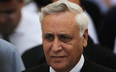 Former President Moshe Katsav walks out from the Supreme Court in Jerusalem on November, 2011 after Israel's Supreme Court unanimously upheld a rape conviction and a seven-year prison sentence. (photo credit: Kobi Gideon / Flash90)