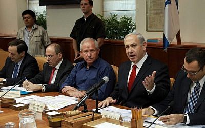 Benjamin Netanyahu (right) at a weekly cabinet meeting in Jerusalem (photo credit: Marc Israel Sellem/Flash90)