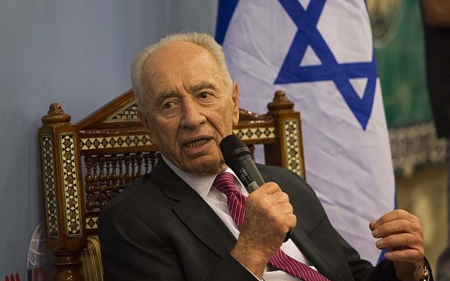 President Shimon Peres speaks during a conference at the Mount Zion hotel in Jerusalem, October 30 (photo credit: Yonatan Sindel/Flash90)