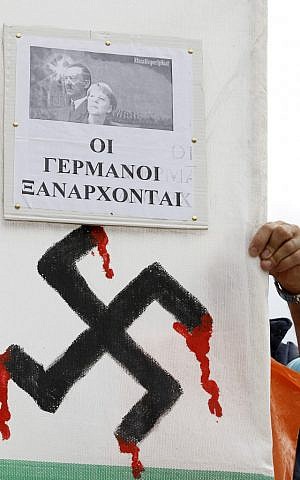 Di Yunani, pengunjuk rasa menyapa pemimpin Jerman dengan salam Nazi