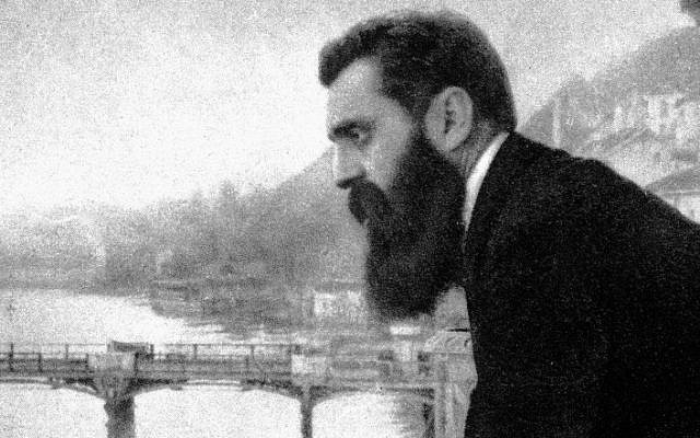 Theodor Herzl on the balcony of the Hotel Les Trois Rois in Basel, Switzerland, 1897. (CC-PD-Mark, by Wikigamad, Wikimedia Commons)