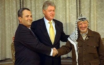 Ehud Barak, left, with Bill Clinton and Yasser Arafat (photo credit: Sharon Farmer)