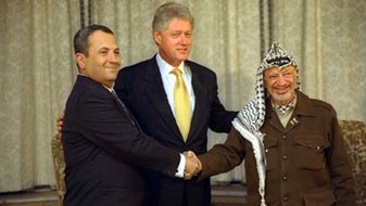 Ehud Barak, left, with Bill Clinton and Yasser Arafat (photo credit: Sharon Farmer)