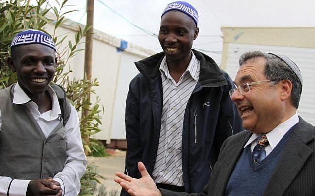 Rabbi Shlomo Riskin, right, welcomes students arriving from Uganda who will spend time at his Efrat yeshiva,  January 3, 2012. Photo by Gershon Elinson/Flash90)