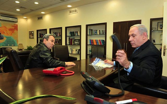 Prime Minister Benjamin Netanyahu speaks with Defense Minister Ehud Barak at the Defense Ministry in Tel Aviv on November 14, 2012. (photo credit: Ariel Hermoni/Defense Ministry/Flash90)