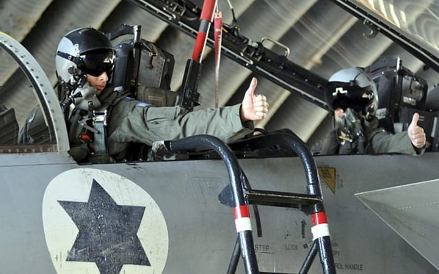 An Israeli pilots sits at the cockpit of his F-15 Eagle fighter jet in an Israeli Air Force Base. (photo credit: Yossi Zeliger/Flash90)
