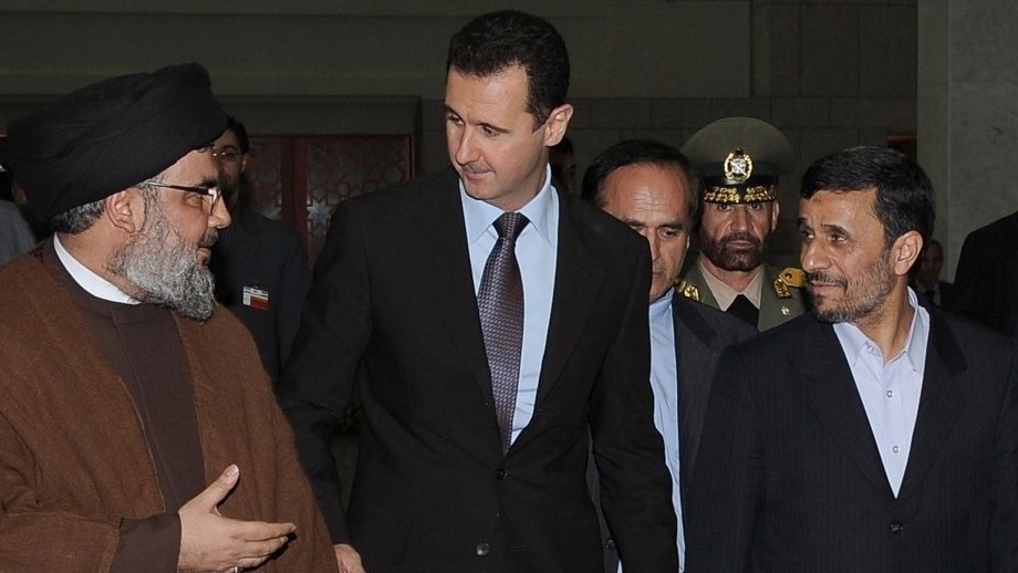 Hezbollah leader sheik Hassan Nasrallah, left, speaks with Syrian President Bashar Assad, center, and Iranian President Mahmoud Ahmadinejad, right, upon their arrival for a dinner in Damascus, Syria, February 25, 2010 (photo credit: AP/SANA)