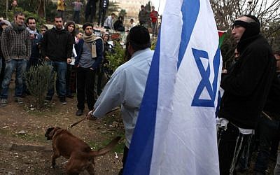 A confrontation between Jewish settlers and Arab residents in the Sheikh Jarrah neighborhood of East Jerusalem in 2011 (photo by Sliman Khader/Flash90)